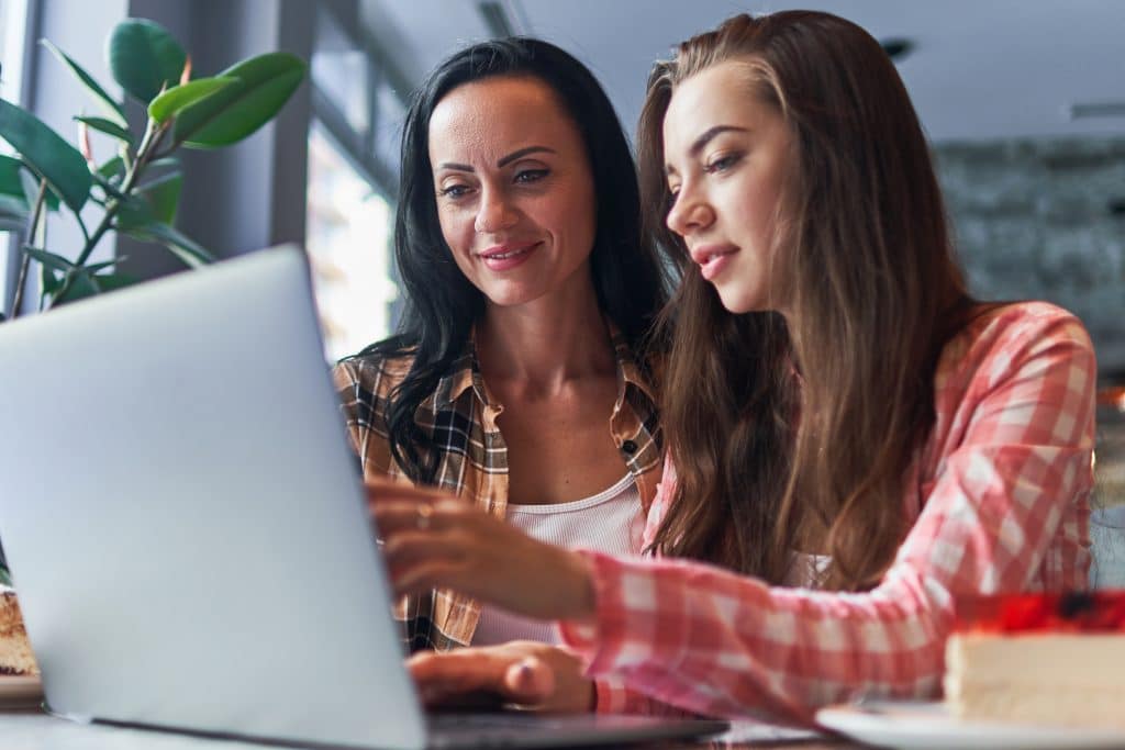 Mom and daughter working through their homeschool day together